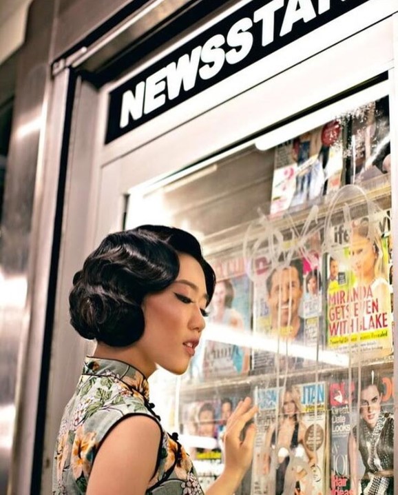 Model wearing vintage finger wave and qipao at NYC subway.